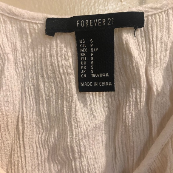 Shoulder cut out white flowy top - Picture 2 of 3